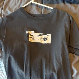 John Galt (brandy melville) Black Graphic Tee with Yellow Eye Print